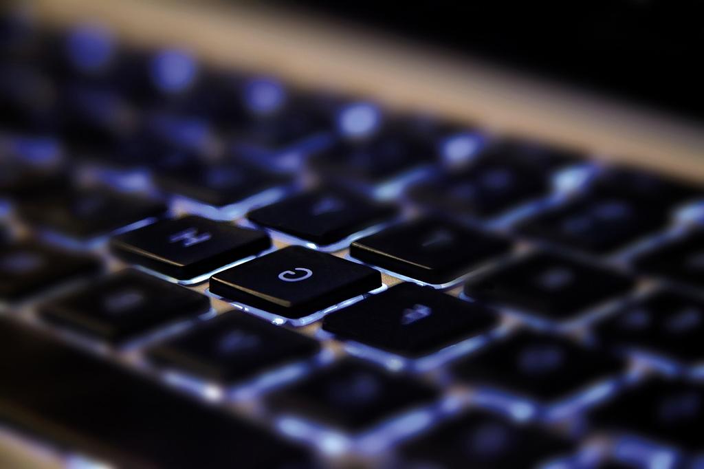 Futuristic neural computing system with glowing synaptic connections and real-time data visualization dashboard