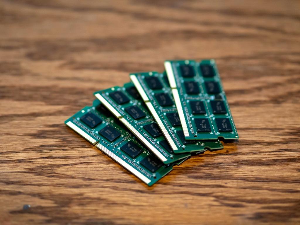 Close-up of DDR5 RAM modules glowing blue light